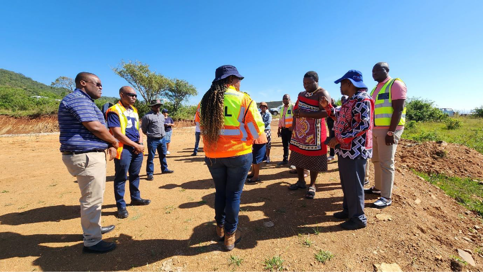 On the 13 th April the Honourable Minister of Public Works and Transport of the Kingdom of Eswatini toured household resettlement sites where construction has started. This photo was taken during the tour.