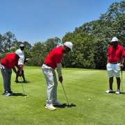 ESR Golf Day 2024 — Players putting on the green