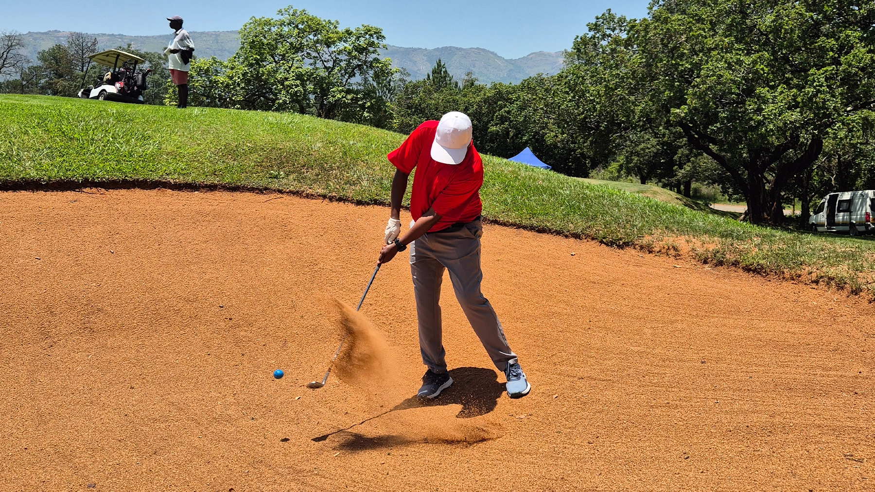 ESR Golf Day 2024 — Playing out of the bunker