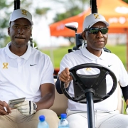 ESR Golf Day 2025 — Golfers together in a cart